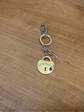 Dooney & Bourke Gold-tone Padlock Key Charm